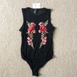 Forever 21 Black sheer bodysuit with floral decal size Large, NWT